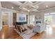 Stylish living room with decorative ceiling and hardwood floors at 10 Princeton Manor Dr, Youngsville, NC 27596