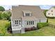 Charming two-story home with landscaped yard, deck and stairs to the backyard at 10 Princeton Manor Dr, Youngsville, NC 27596
