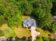 Gorgeous aerial view of manicured lawns and stunning traditional architecture at 100 Panoramic Ct, Cary, NC 27519