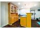 Basement bar area with wine rack, cabinetry, and countertop space at 100 Panoramic Ct, Cary, NC 27519