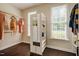 Spacious walk-in closet with shelving, mirrored cabinet, and natural light from windows at 100 Panoramic Ct, Cary, NC 27519