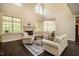 Bright living room with a fireplace, hardwood floors, and abundant natural light at 100 Panoramic Ct, Cary, NC 27519