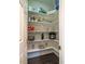 Organized pantry providing ample shelving for food storage and household supplies at 100 Panoramic Ct, Cary, NC 27519