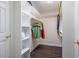 Walk-in closet with shelving and hanging space for clothes organization at 100 Panoramic Ct, Cary, NC 27519