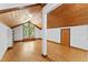 Large bedroom with vaulted wood ceiling and large window at 1000 Phils Creek Rd, Chapel Hill, NC 27516