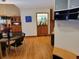 Elegant dining room featuring hardwood floors, a wet bar, and stylish decor at 1000 Phils Creek Rd, Chapel Hill, NC 27516