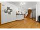 Stylish entryway with hardwood floors, white walls, and a staircase, giving a grand sense of arrival at 1000 Phils Creek Rd, Chapel Hill, NC 27516