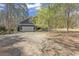 Home exterior showcasing an attached two-car garage at 1000 Phils Creek Rd, Chapel Hill, NC 27516