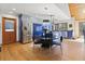 Bright kitchen features blue cabinets, stainless steel appliances, and a large island at 1000 Phils Creek Rd, Chapel Hill, NC 27516