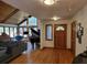 Sun-filled living room boasting cathedral ceilings, large windows, and elegant pianos at 1000 Phils Creek Rd, Chapel Hill, NC 27516