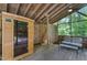 Pool house with sauna, shower and seating at 1000 Phils Creek Rd, Chapel Hill, NC 27516