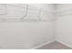 Walk-in closet with shelving and plush carpet at 1012 Old Evergreen Dr, Durham, NC 27704