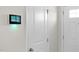 Entryway featuring a security panel and white doors at 1012 Old Evergreen Dr, Durham, NC 27704