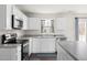 Well-equipped kitchen featuring stainless steel appliances, ample cabinetry, and modern countertops at 1012 Old Evergreen Dr, Durham, NC 27704