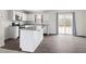 Modern kitchen with stainless steel appliances, ample counter space, and a convenient island at 1012 Old Evergreen Dr, Durham, NC 27704