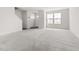 Open-concept living room with natural light at 1012 Old Evergreen Dr, Durham, NC 27704