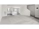 Spacious living area with an open floor plan, seamlessly connected to the kitchen and staircase at 1012 Old Evergreen Dr, Durham, NC 27704