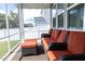 Comfortable screened porch with cushioned seating and natural light at 1016 Matterhorn Dr, Fuquay Varina, NC 27526