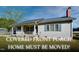 Charming single-story home featuring a welcoming covered front porch, complemented by green shutters and a well-maintained lawn at 107 N Pearl St, Princeton, NC 27569