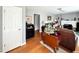 Inviting living room with hardwood floors, gray walls, and a white painted fireplace at 107 N Pearl St, Princeton, NC 27569