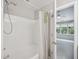 This bright bathroom features a shower-tub combo, and a green towel at 111 Grey Elm Trl, Durham, NC 27713