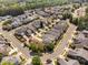 Residential area aerial view showcasing homes with well-kept yards and tree-lined streets at 112 Homegate Cir, Apex, NC 27502