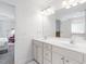 Bright bathroom features double vanity with lots of light and tub at 112 Homegate Cir, Apex, NC 27502