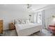 Bedroom features a large bed, windows, and natural light at 112 Homegate Cir, Apex, NC 27502