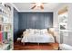 Stylish room with a daybed, built-in shelving, and a large window, providing a serene atmosphere at 112 Homegate Cir, Apex, NC 27502
