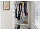 Walk-in closet with organized shelving and clothing racks at 112 Homegate Cir, Apex, NC 27502