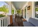 Front porch with a swing, outdoor seating, and stylish decor for relaxed outdoor living at 112 Homegate Cir, Apex, NC 27502