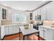 Kitchen with white cabinets, stainless steel appliances, and a center island at 112 Homegate Cir, Apex, NC 27502