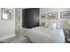Cozy bedroom with an accent wall and stylish decor at 113 Amberwing Ct, Holly Springs, NC 27540