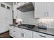 Close-up of kitchen countertops and cabinets at 113 Amberwing Ct, Holly Springs, NC 27540