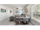 Inviting living room with a large sofa, entertainment center, and cozy ambiance for relaxation at 113 Amberwing Ct, Holly Springs, NC 27540