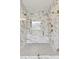 Luxurious shower featuring glass enclosure, marble-patterned tile, and seat at 1218 Red Cedar Ct, Youngsville, NC 27596