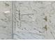 Detail of modern shower features marble-tiled walls, a rainfall showerhead, and brushed gold fixtures at 1218 Red Cedar Ct, Youngsville, NC 27596