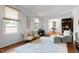 Bright and airy living room featuring classic furnishings, natural light, and hardwood floors at 1305 Kimberly Dr, Raleigh, NC 27609