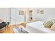 Bedroom with hardwood floors, neutral decor, and decorative artwork at 1307 Arnette Ave, Durham, NC 27707