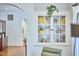 Close-up of a charming built-in bookcase with glass doors, adding character to the living space at 1307 Arnette Ave, Durham, NC 27707
