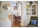 Elegant dining room with hardwood floors, stylish chandelier, and inviting open layout at 1307 Arnette Ave, Durham, NC 27707