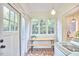 Mud Room with brick flooring and natural light at 1307 Arnette Ave, Durham, NC 27707