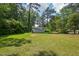 Spacious backyard with a detached shed and plenty of green space at 1331 Sunset Ave, Rocky Mount, NC 27804