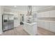 Spacious kitchen featuring white cabinets, quartz counters, stainless appliances, and island at 1331 Sunset Ave, Rocky Mount, NC 27804