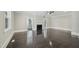 Bright living room featuring gleaming hardwood floors, a decorative fireplace, and neutral paint at 1331 Sunset Ave, Rocky Mount, NC 27804