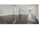 Spacious living area features dark wood floors, a staircase, and open layout at 1331 Sunset Ave, Rocky Mount, NC 27804
