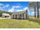 Charming home with a well-manicured lawn and detached garage at 1347 Crocker Rd, Smithfield, NC 27577