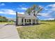 Charming home with a long drive leading to a covered carport at 1347 Crocker Rd, Smithfield, NC 27577