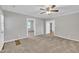Spacious living room featuring neutral colors and seamless transitions to other rooms at 1347 Crocker Rd, Smithfield, NC 27577