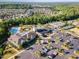 An aerial view of community with pool, clubhouse, tennis courts and parking at 1522 Palmer Hill Dr, Durham, NC 27703